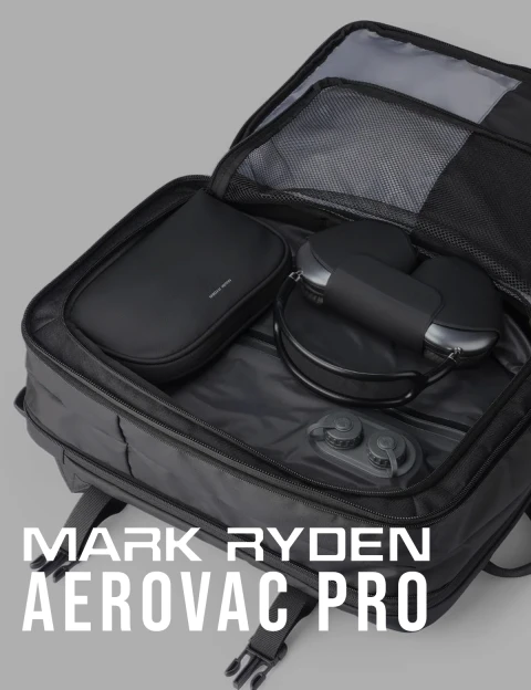 Mark Ryden Aerovac Pro Black open inside a backpack, product name overlay